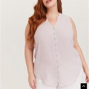 Sleeveless button up blouse